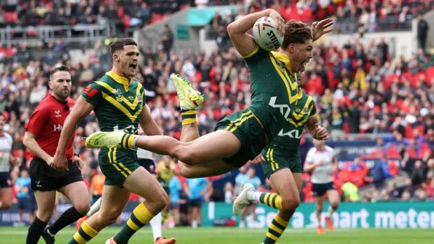 Reece Walsh of Australia celebrates scoring the opening try during the Rugby League Ashes match between England and Australia at Wembley Stadium on October 25, 2025