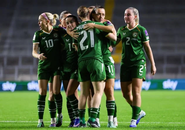Katie McCabe celebrates her goal with Murphy.