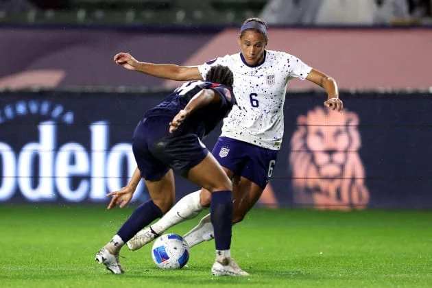Defending against USA star Lynn Williams in 2024.