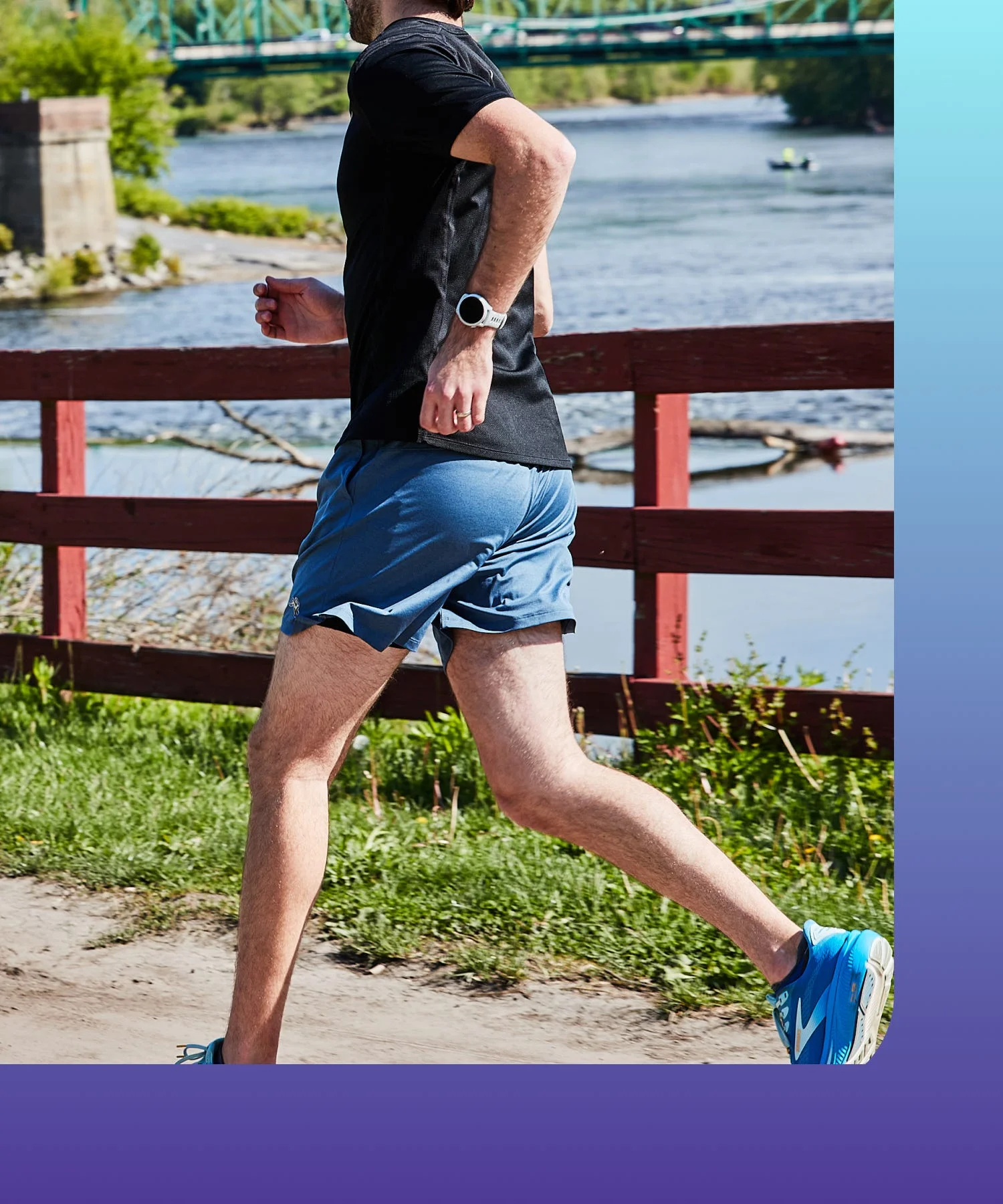 Person jogging along a riverbank. Person jogging along a riverbank.